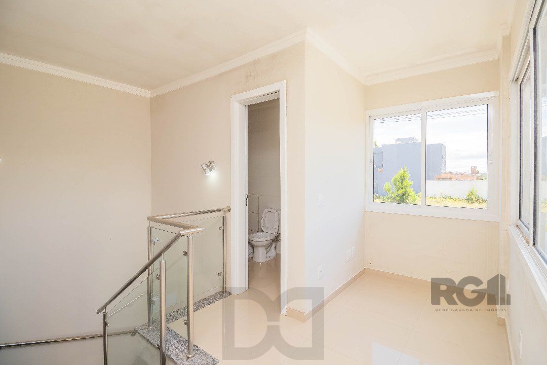 Sobrado, 185 metros quadrados privativo, com 3 quartos, 1 suíte, Living e cozinha integrados, lareira, churrasqueira, lavabo e 2 vagas de garagem. e 2 vagas de garagem — foto 25