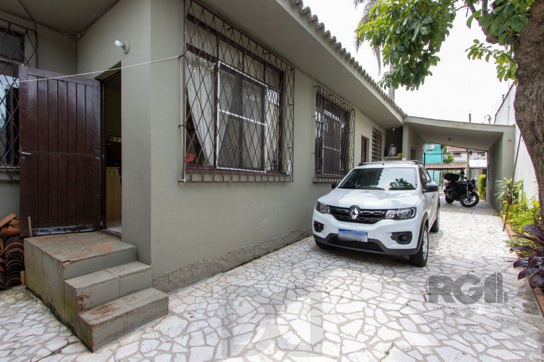 Casa térrea, 3 quartos, 2 banheiros, com pátio no Bairro Cavalhada — foto 32