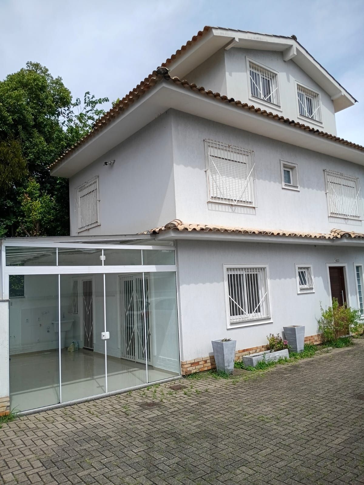 Casa de condomínio com 3 dormitórios no bairro Ipanema — foto 1