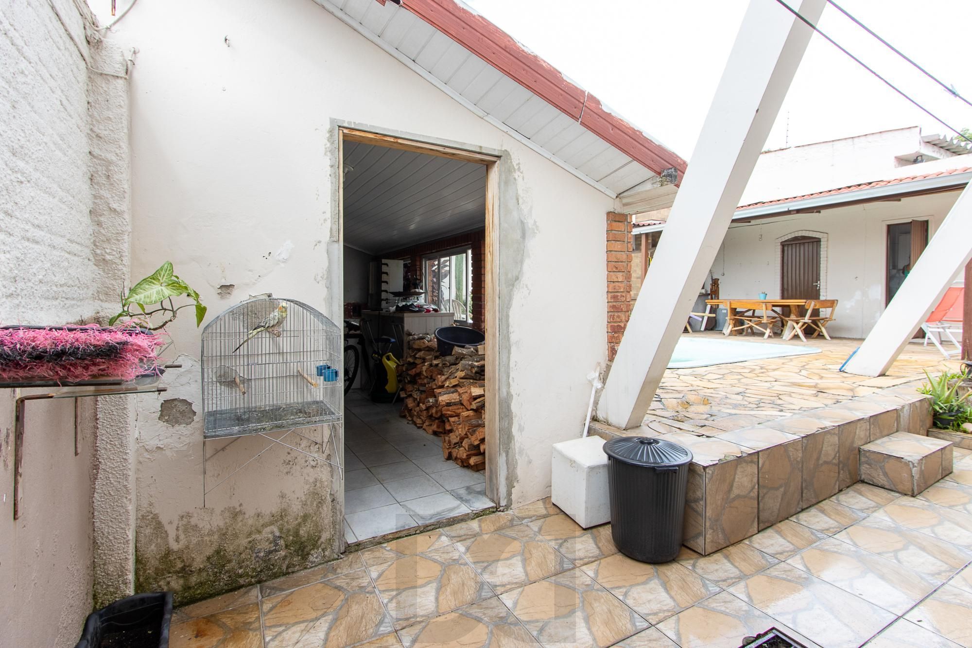 Casa de 4 dormitórios, 2 suítes, piscina, pátio e 2 vagas de garagem. — foto 41