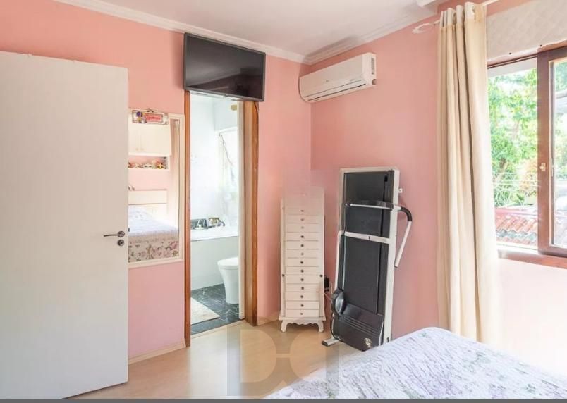 Linda casa com 3 dormitórios, sendo 1 Suíte, Sala Ampla no Condomínio de Ótima Localização — foto 18