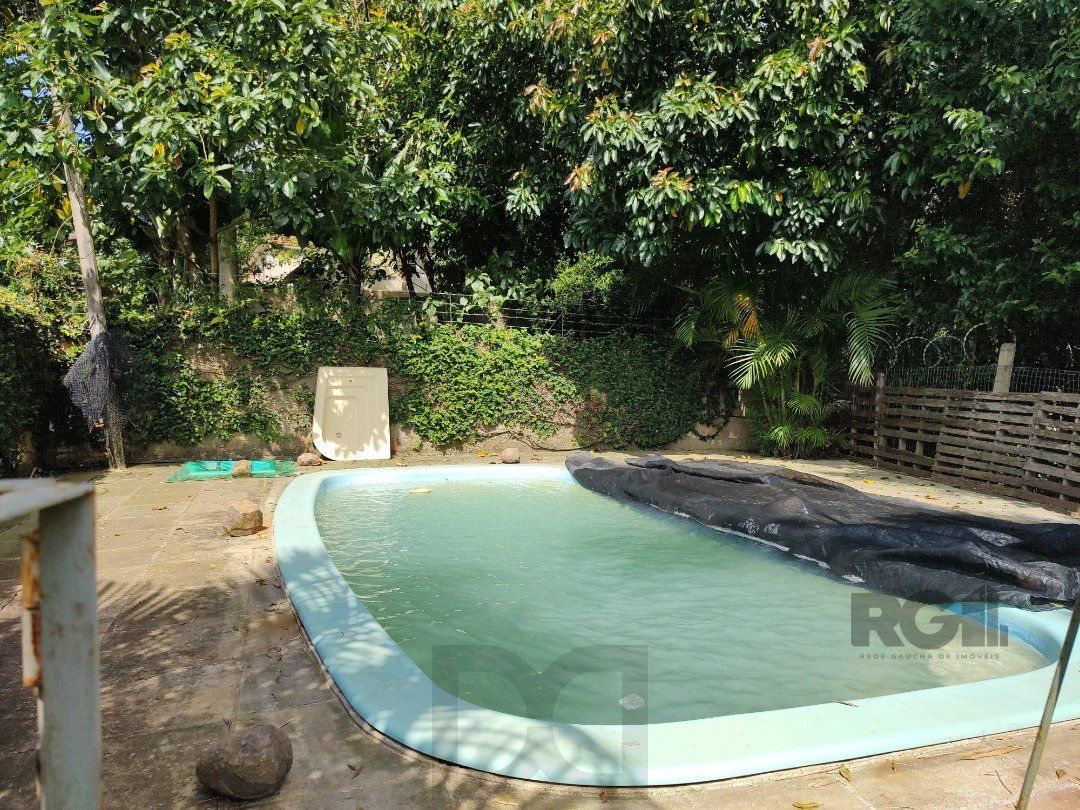 Casa térrea, 2 quartos, edícula com 2 quartos, pático, piscina - Bairro Cavalhado — foto 16