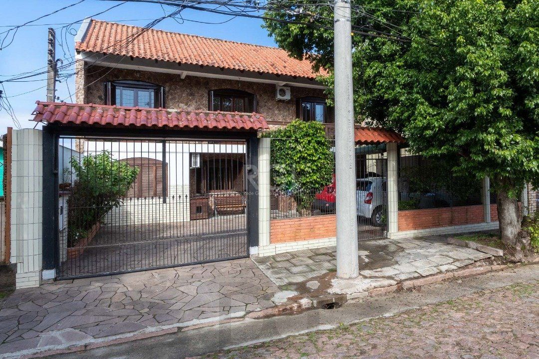 Casa para Venda - 300m², 5 dormitórios, 2 vagas - Cavalhada — foto 1