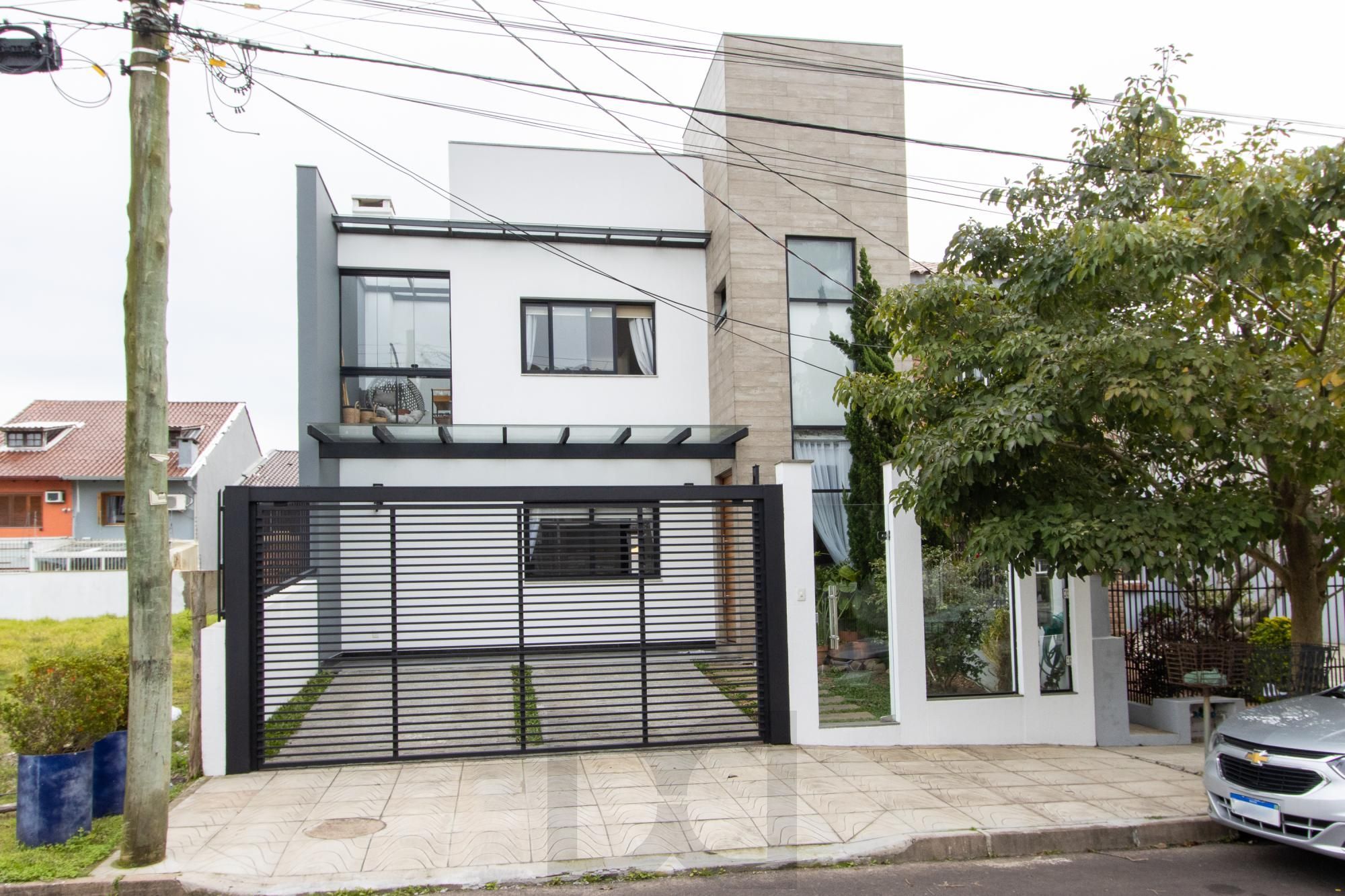 Excelente casa de alvenaria, 4 dormitórios, 2 suítes e 2 vagas de garagem. — foto 1