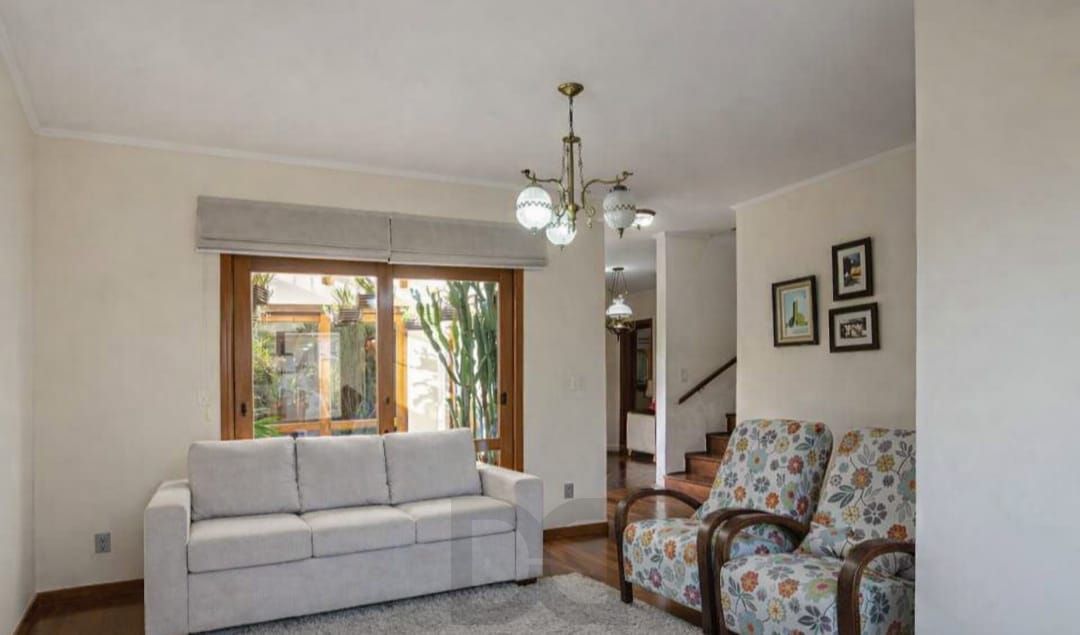 Casa à venda com 5 dormitórios, 392m² e 4 vagas no bairro Vila Assunção, Zona Sul de Porto Alegre — foto 1