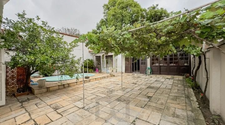 Casa de 3 dormitórios, 1 suíte e 3 vagas de garagem, bairro Ipanema. — foto 15