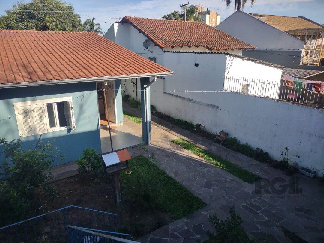 Casa com 250m², 2 quartos, 1 suite, edícula, no bairro Nonoai — foto 2