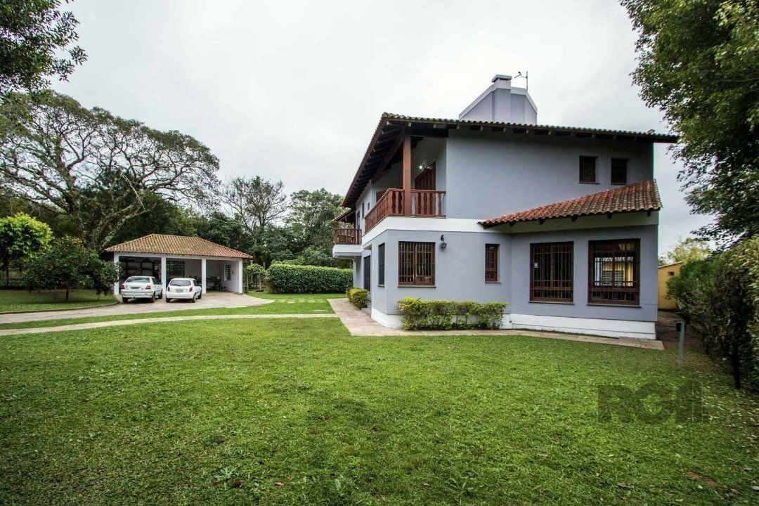 Sobrado com 6 suites, lareira, lavabo, pátio - Bairro Belém Velho — foto 2