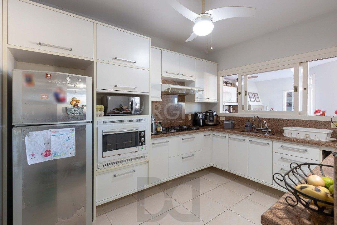 Casa para Venda com 4 dormitórios no bairro Hípica — foto 10