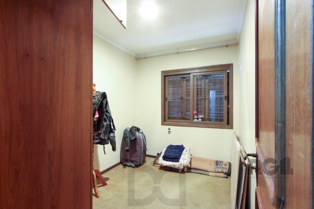 Casa a venda com 03 dormitórios, living 03 ambientes com vista para o Rio. — foto 46