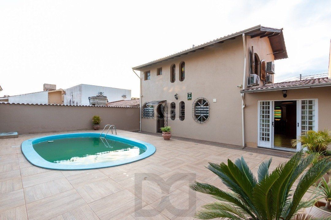 Casa para Venda - 232.5m², 3 dormitórios, sendo 1 suites, 4 vagas - Nonoai — foto 28