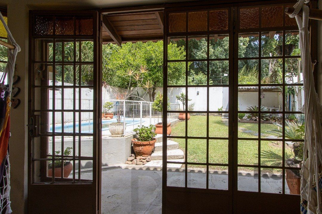 Casa para Venda - 300m², 3 dormitórios, sendo 1 suites, 4 vagas - Nonoai — foto 23