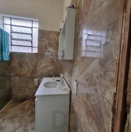 Casa de 4 dormitórios, 2 banheiros para venda pronta para morar no bairro Partenon em Porto Alegre/RS. — foto 11