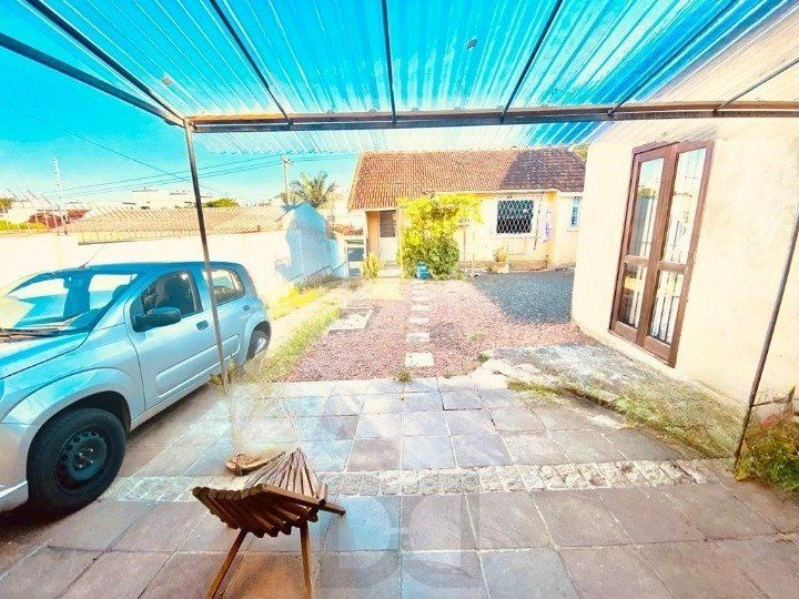 CASA BAIRRO CAMAQUÃ COM 4 DORMITORIOS — foto 1