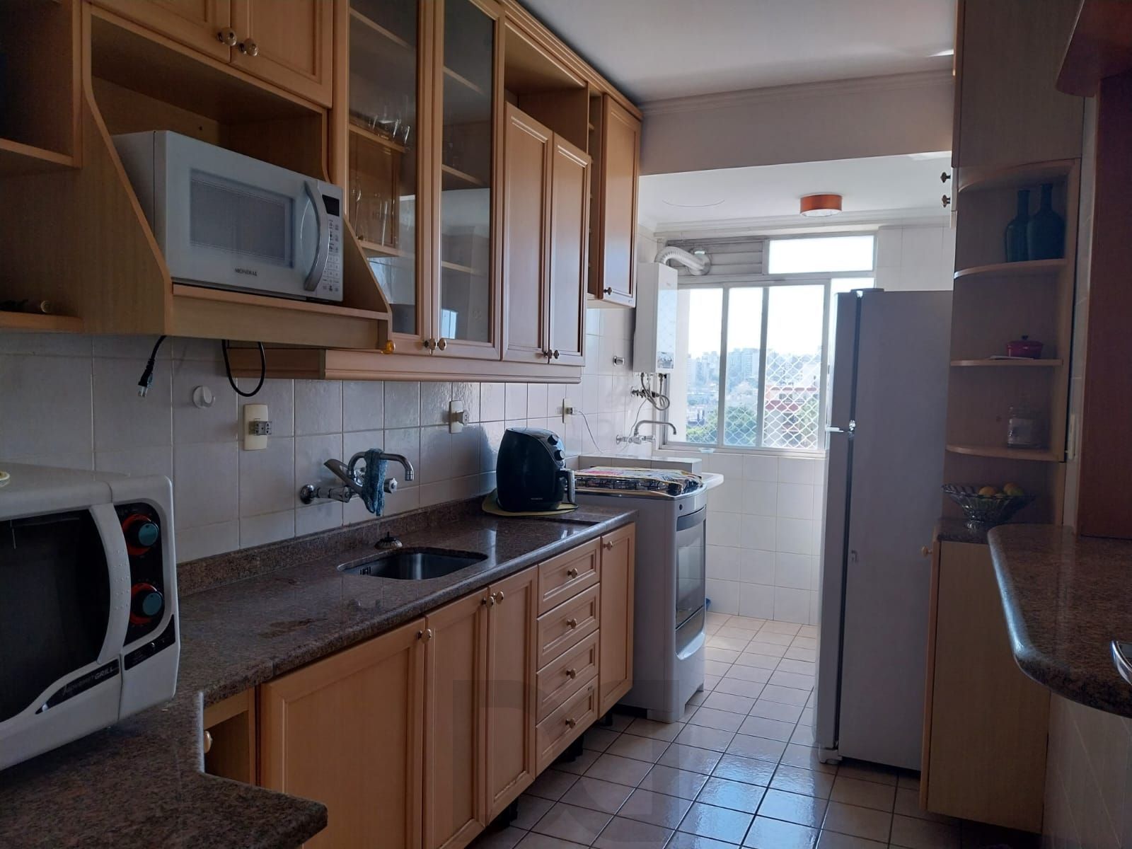 Apartamento de 2 dormitórios com vaga de garagem e sacada no Bairro Santana — foto 16