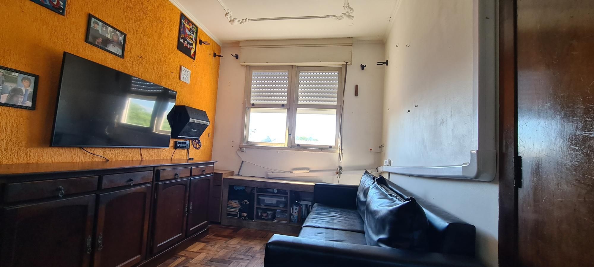 Apartamento de 2 dormitorios e vaga de garagem rotativa em Porto Alegre. — foto 1