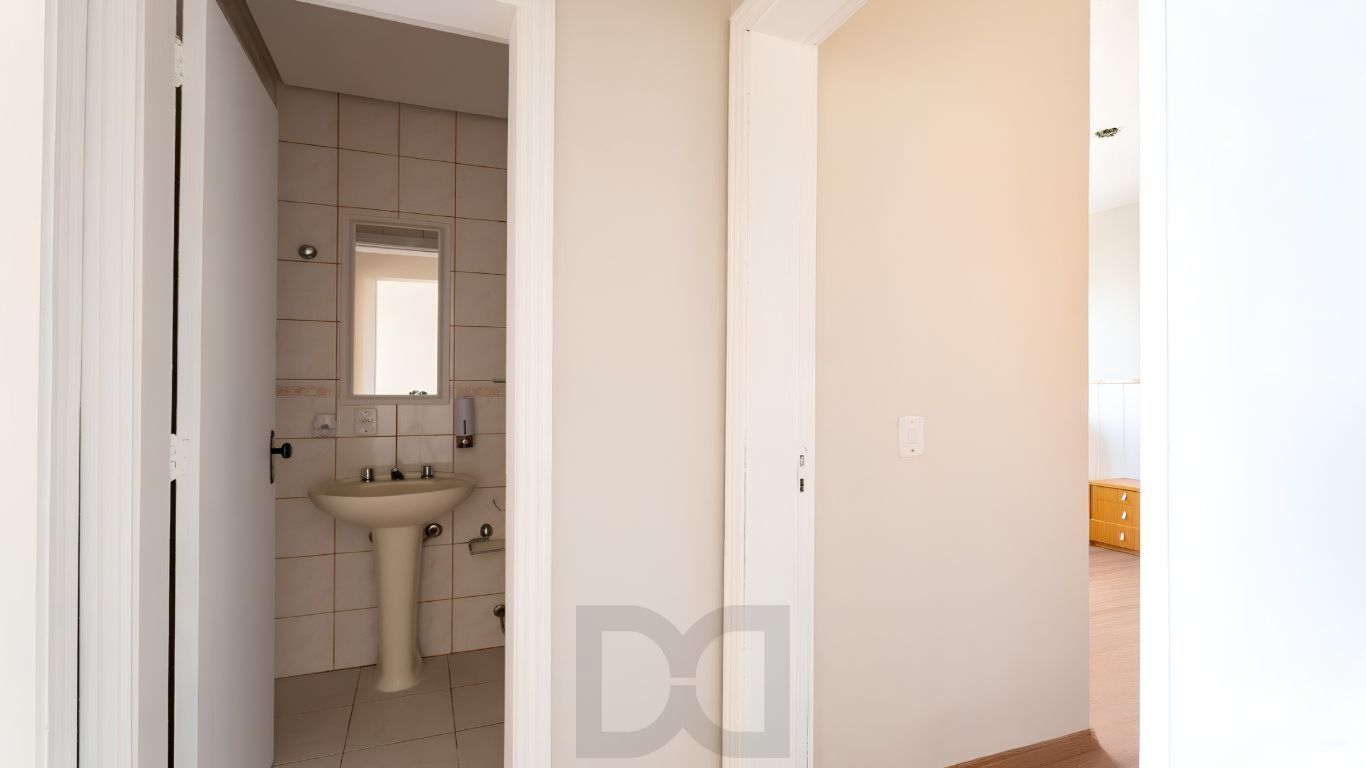 Apartamento 2 dormitórios, 1 suíte, com lareira e living para 2 ambientes — foto 7