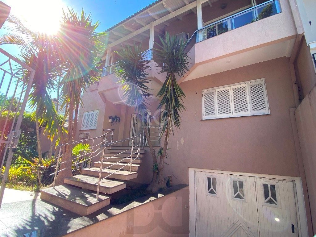 Casa para comprar com 4 dormitórios, 330m² - Chácara das Pedras - Porto Alegre — foto 1