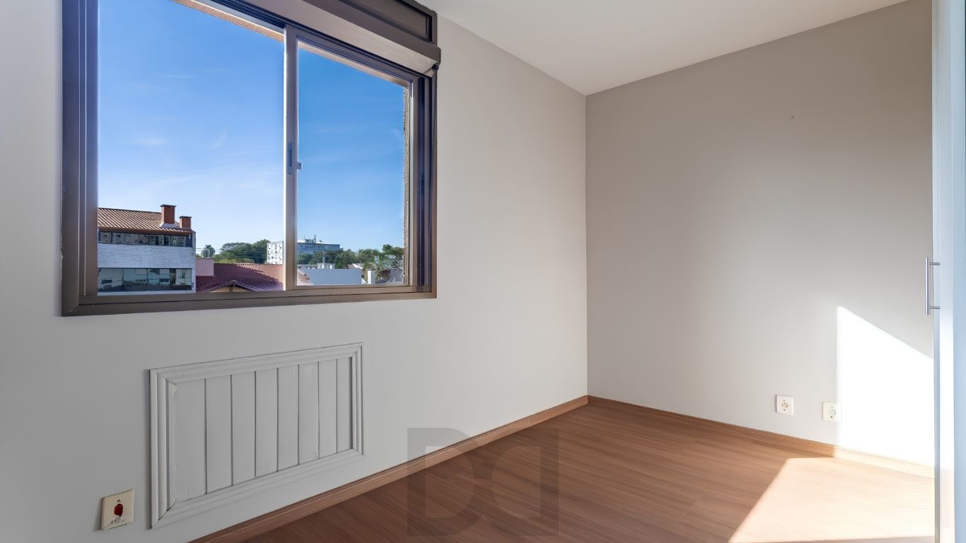 Apartamento 2 dormitórios, 1 suíte, com lareira e living para 2 ambientes — foto 10