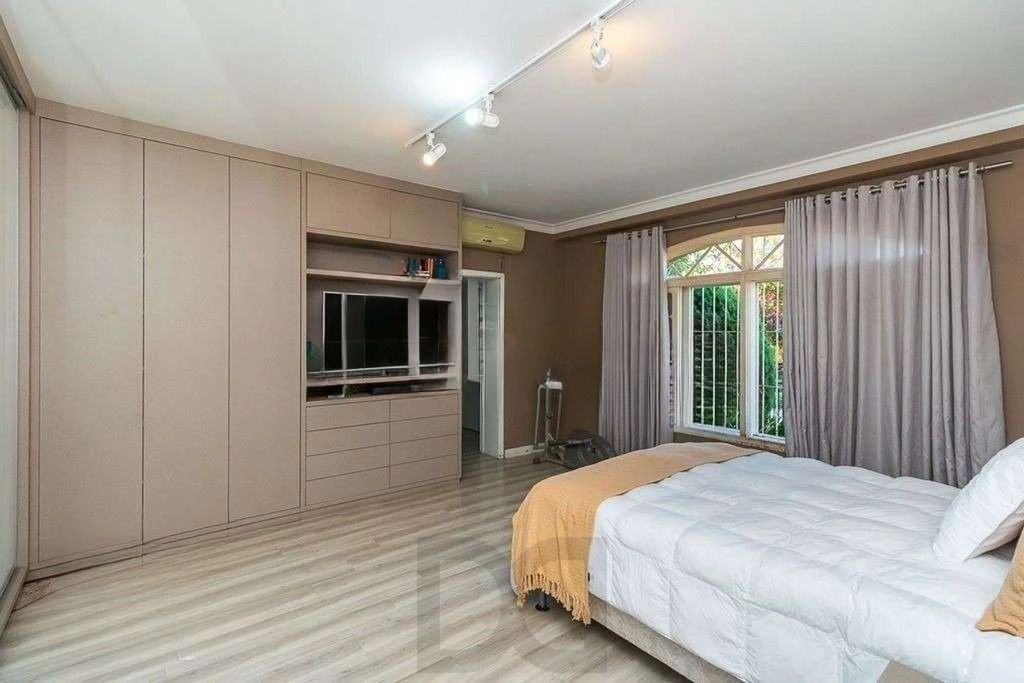 Belíssima casa com piscina, 5 dormitórios e 5 vagas no Jardim Lindóia — foto 25
