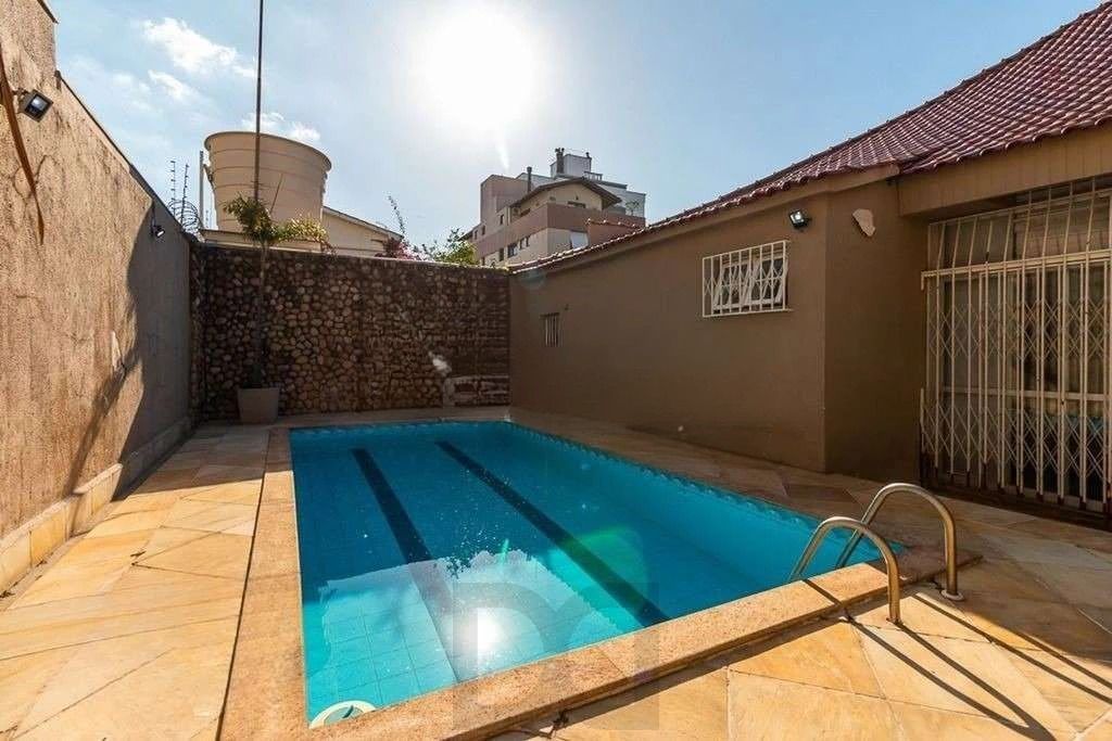 Belíssima casa com piscina, 5 dormitórios e 5 vagas no Jardim Lindóia — foto 9