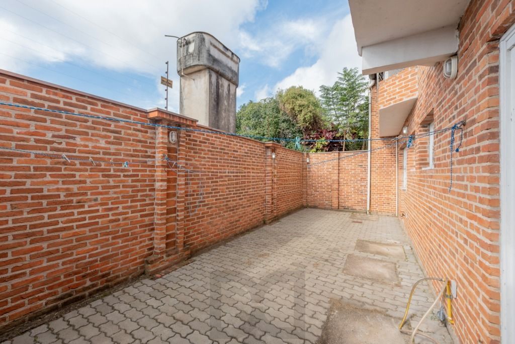 Casa com 4 dormitórios, suíte, churrasqueira e 4 vagas — foto 3