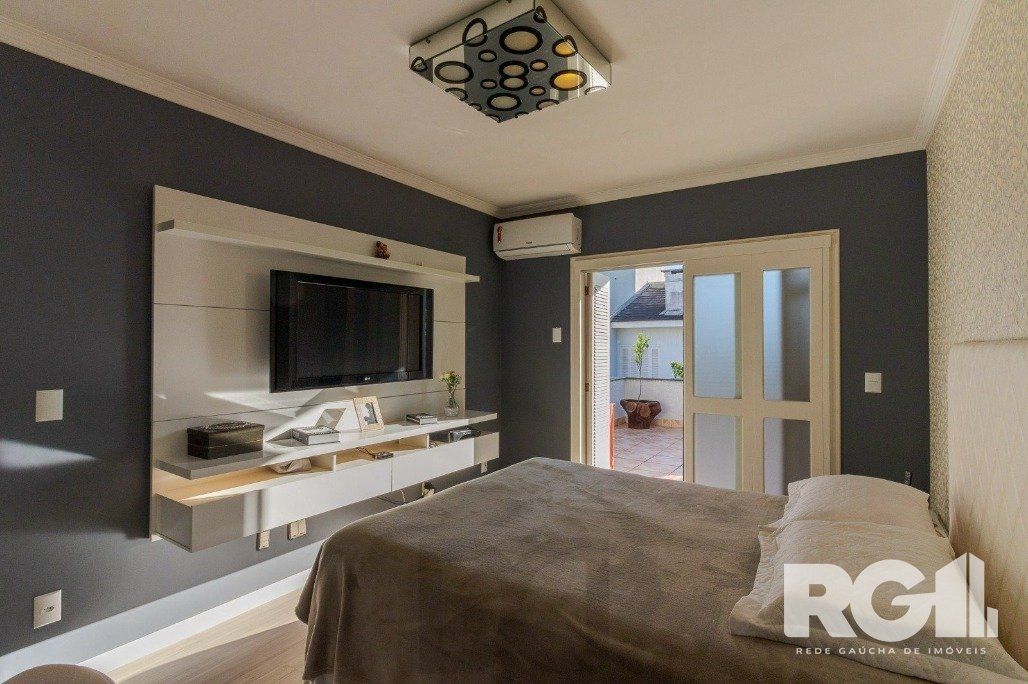 Casa em Condomínio com 3 Suítes, Espaço Gourmet e 5 Vagas de Garagem — foto 13