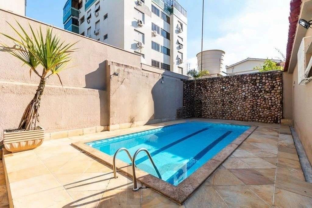 Belíssima casa com piscina, 5 dormitórios e 5 vagas no Jardim Lindóia — foto 8