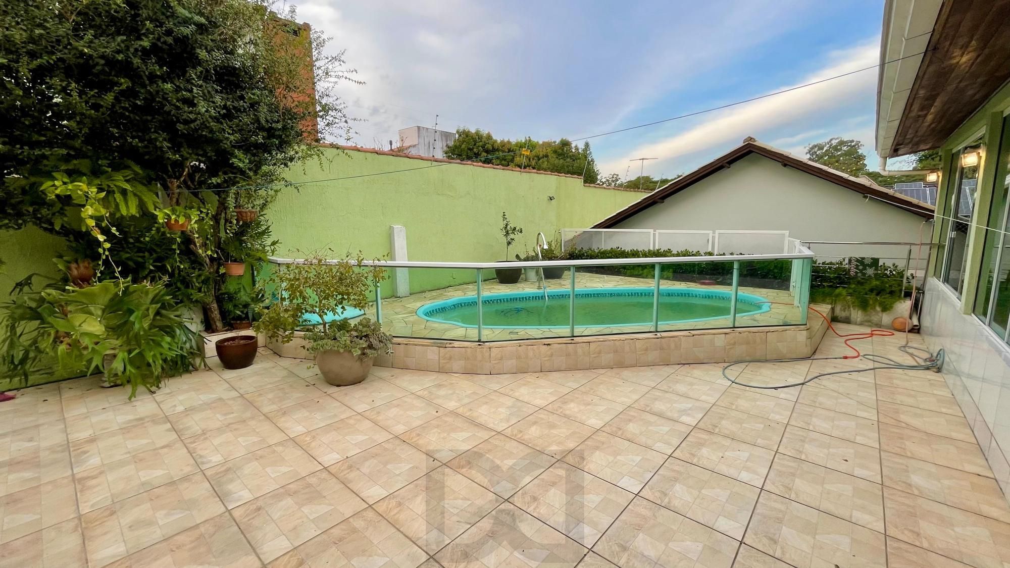 Casa térrea 100% mobiliada com 3 dormitórios, suíte, piscina e 3 vagas. — foto 4