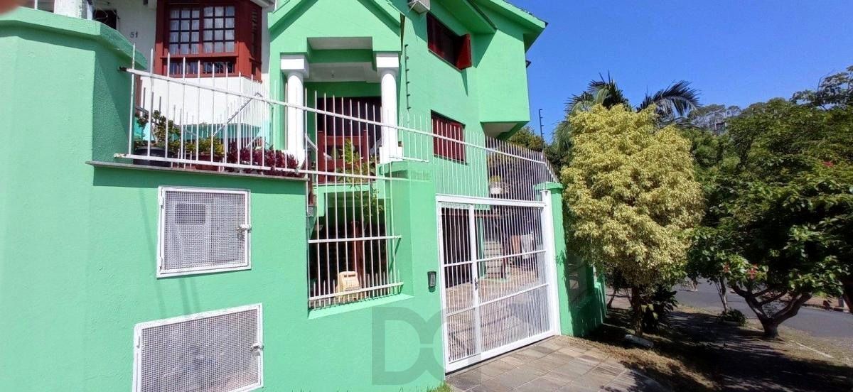 Casa com 4 dormitórios, sótão e amplo pátio próxima ao Hospital Cristo Redentor — foto 23