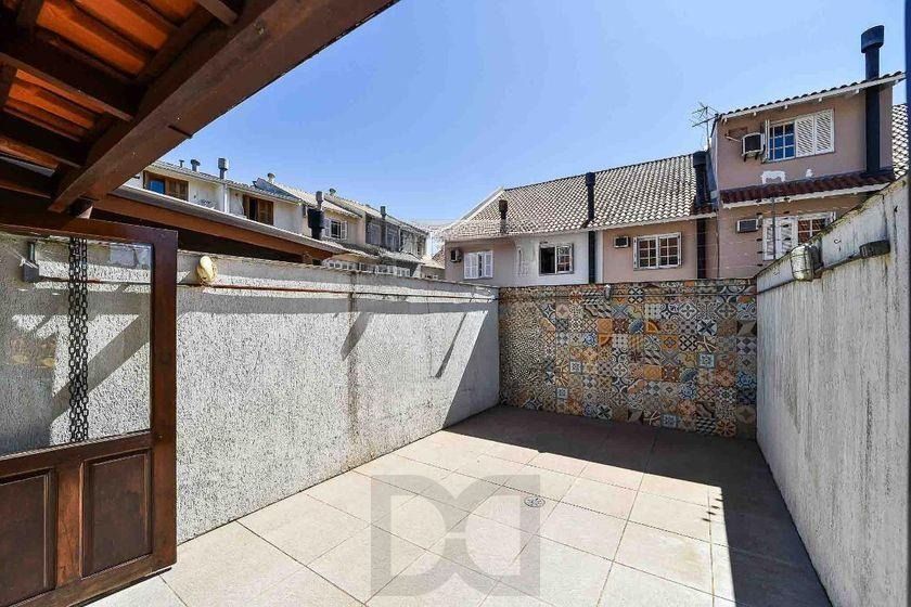 Casa com 3 dormitórios, suíte e churrasqueira. — foto 27