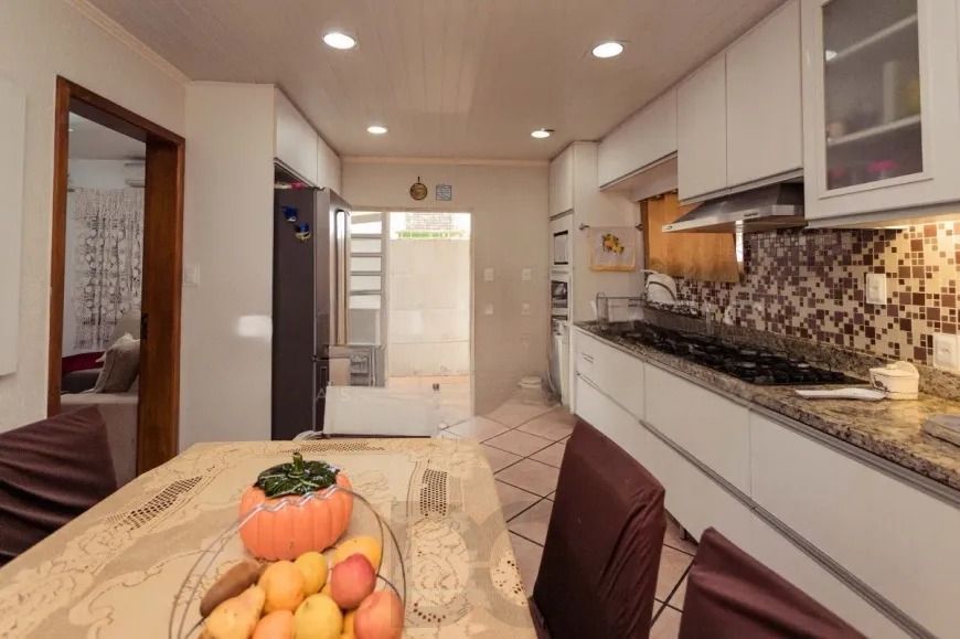 Casa térrea  com 200m² privativos, 3 quartos, Rua Sylvio Sanson - Sarandi — foto 18