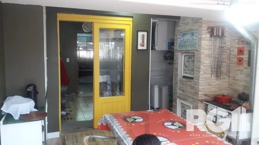 Casa residencial com 3 dormitórios 90m² privativos, e 2 vagas à venda no bairro Parque Santa Fé em Porto Alegre — foto 7