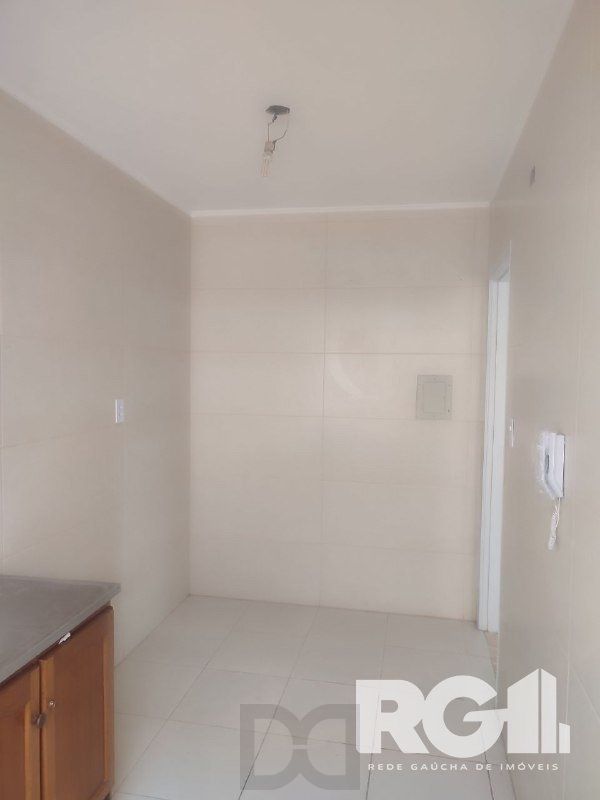 Apartamento reformado com 2 dormitórios 55m² privativos, com vaga no bairro Leopoldina — foto 17