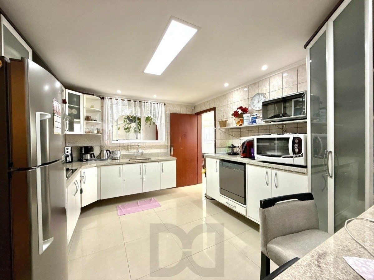 Casa ampla com 4 dormitórios, suíte e área de lazer- Passo da Areia — foto 14
