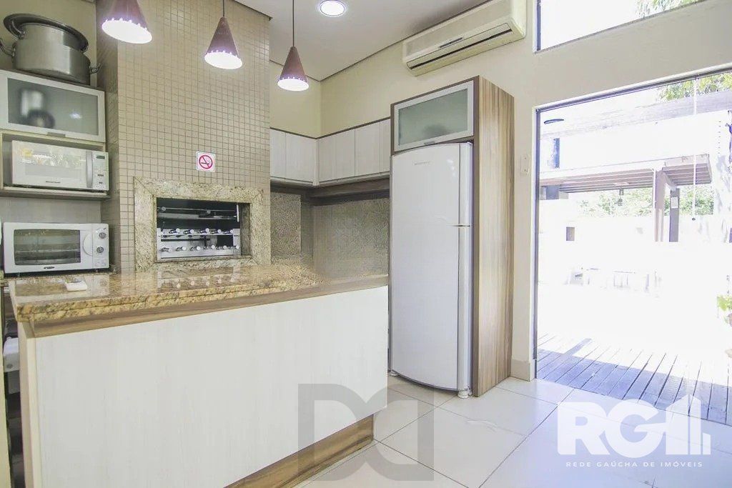 Apartamento com 94m², 3 quartos, 1 suíte, 2 vagas, no bairro Cristo Redentor em Porto Alegre.. — foto 29