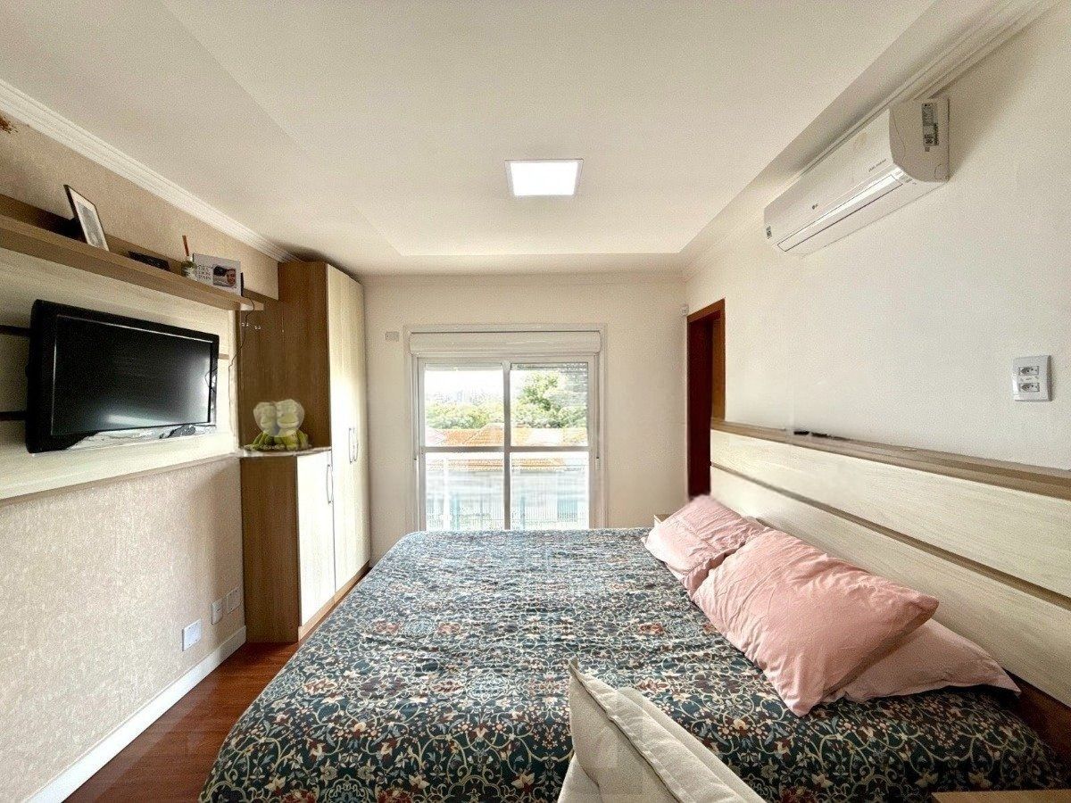Casa ampla com 4 dormitórios, suíte e área de lazer- Passo da Areia — foto 21