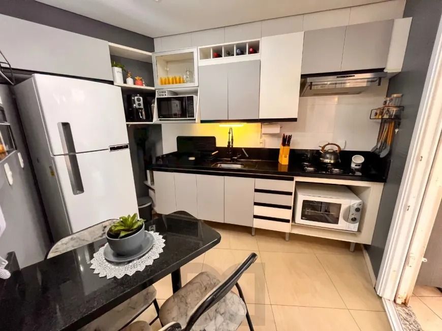 Casa Reformada em Condomínio com Suíte e Espaço Versátil Avenida Ecoville — foto 13