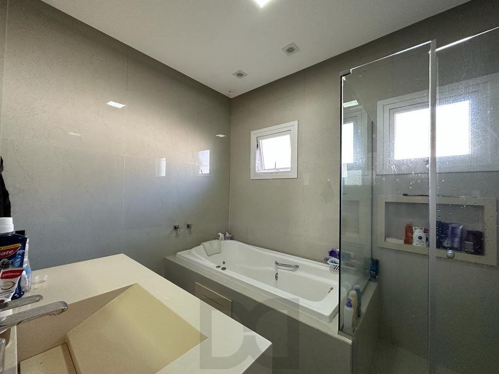 Casa em condomínio com 3 dormitórios, suíte master, espaço gourmet com piscina. — foto 16