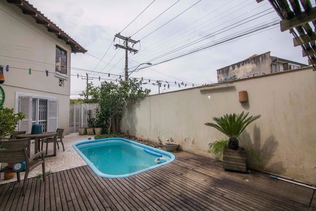 Casa de esquina com 6 dormitórios, 430m², piscina, 4 vagas — foto 12