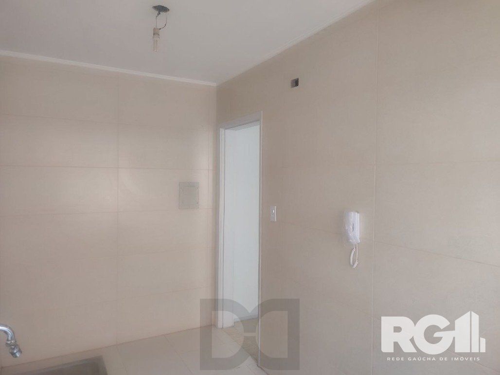 Apartamento reformado com 2 dormitórios 55m² privativos, com vaga no bairro Leopoldina — foto 18