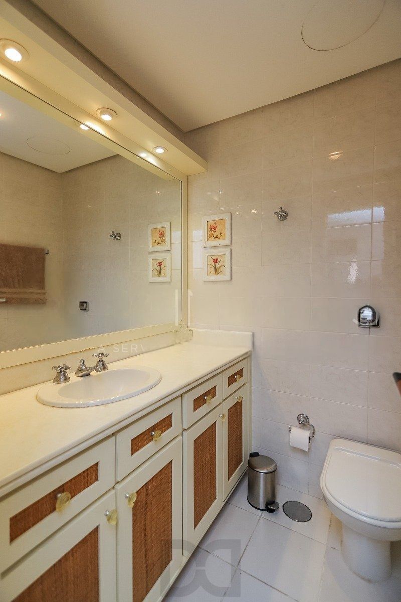 Apartamento com 3 dormitórios, suíte, 2 vagas e varanda com churrasqueira. — foto 17
