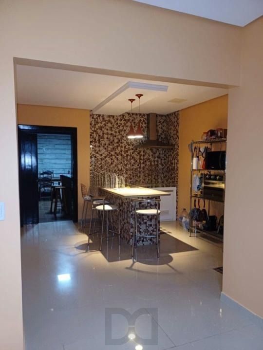 Casa reformada com 3 suítes patio e piscina no bairro Cristo Redentor — foto 8