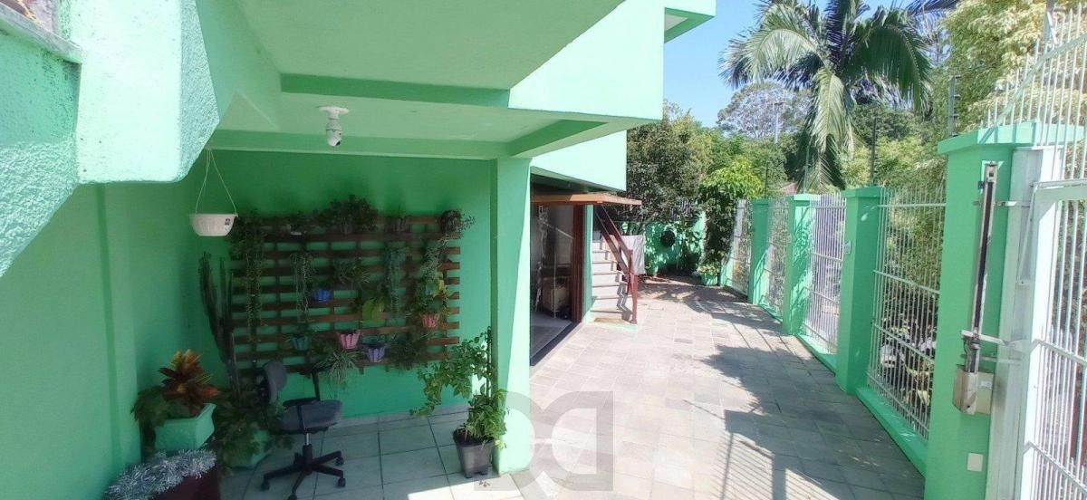 Casa com 4 dormitórios, sótão e amplo pátio próxima ao Hospital Cristo Redentor — foto 19