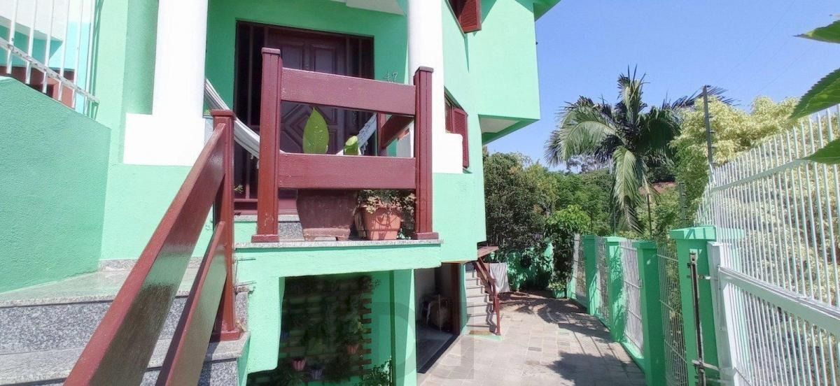 Casa com 4 dormitórios, sótão e amplo pátio próxima ao Hospital Cristo Redentor — foto 20