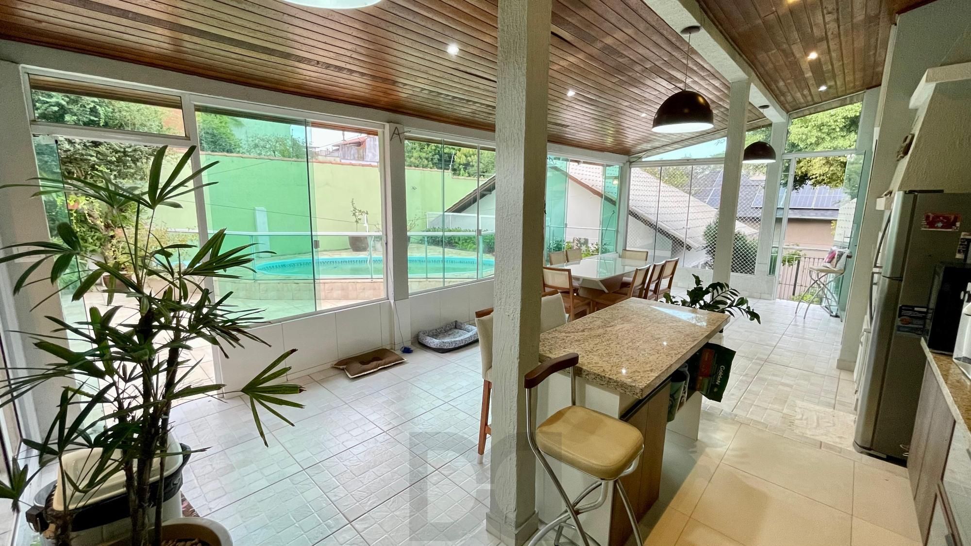 Casa térrea 100% mobiliada com 3 dormitórios, suíte, piscina e 3 vagas. — foto 5