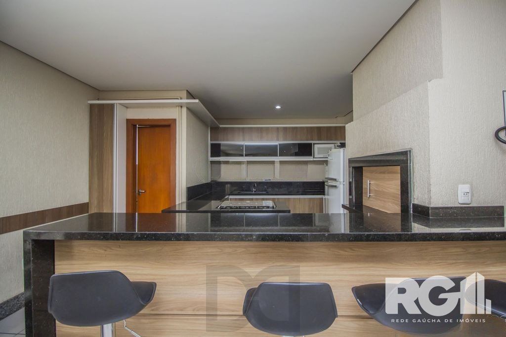 Apartamento com 3 dormitórios, 1 suíte, lavabo, 2 vagas cobertas, semimobiliado, churrasqueira e lareira. — foto 28
