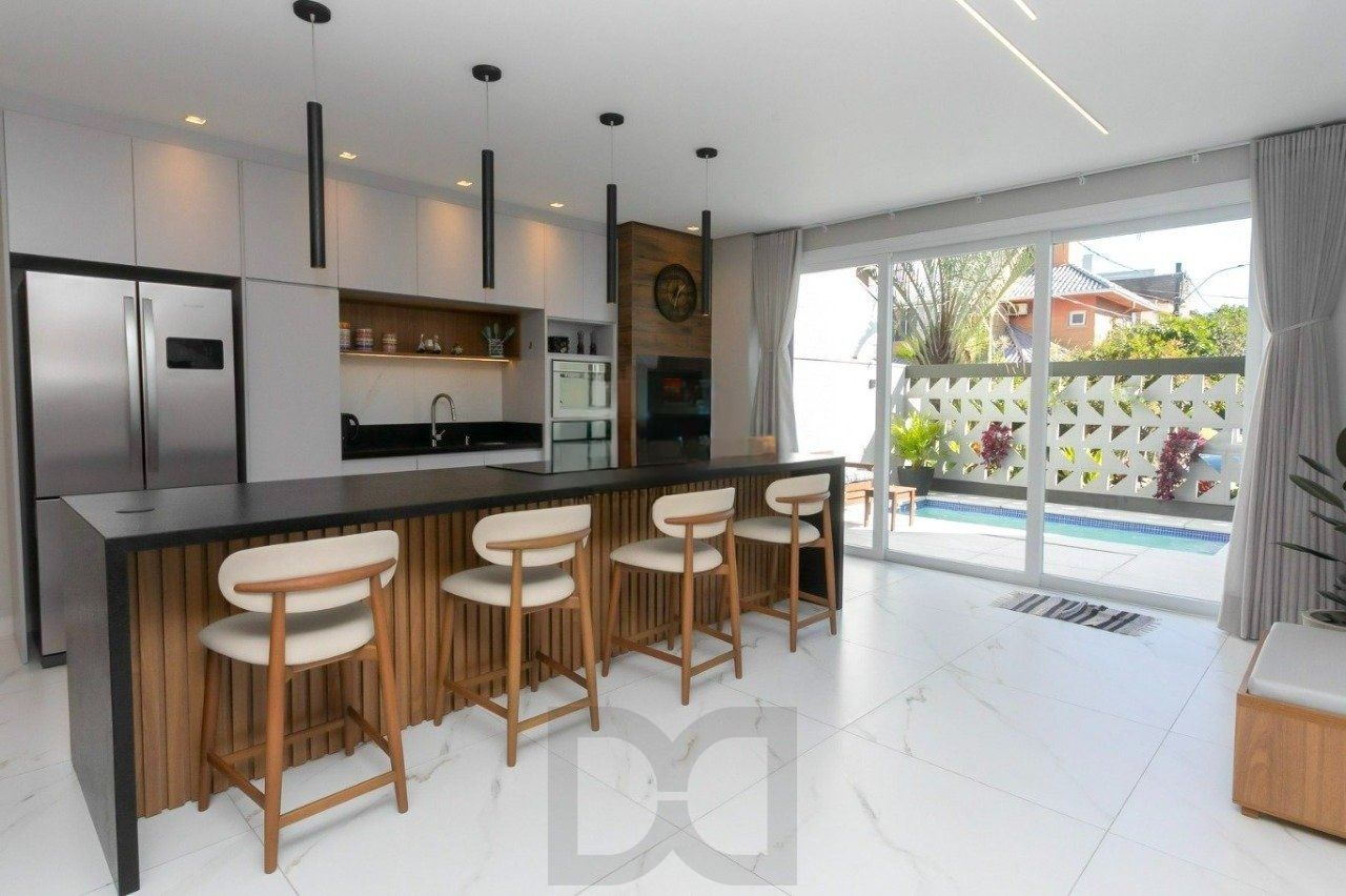 Casa porteira fechada com 3 suítes na Zona Norte de Porto Alegre — foto 1