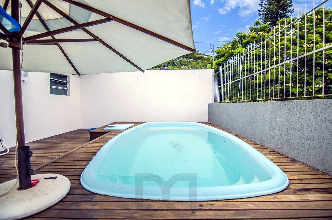 Casa com 3 dormitórios, suíte, piscina e 3 vagas próxima ao Iguatemi — foto 1