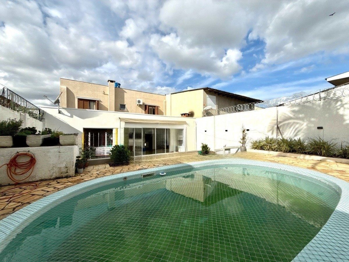 Casa ampla com 4 dormitórios, suíte e área de lazer- Passo da Areia — foto 39